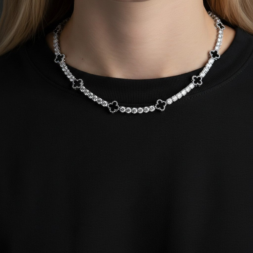Gabrion Clover Tennis Bracelet with VVS Moissanite stones in 925 sterling silver, white gold plated. Symbolizes luck, love, prosperity.